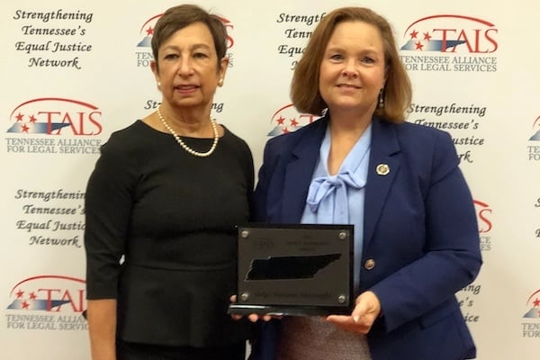 TN Judge Suzanne Baulknight receives the Janice Holder Award from TALS