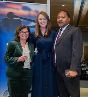 Memphis Bar Association President Lauran Stimac presents her 2025 President's Award to Lucie Brackin and Terrence Reed